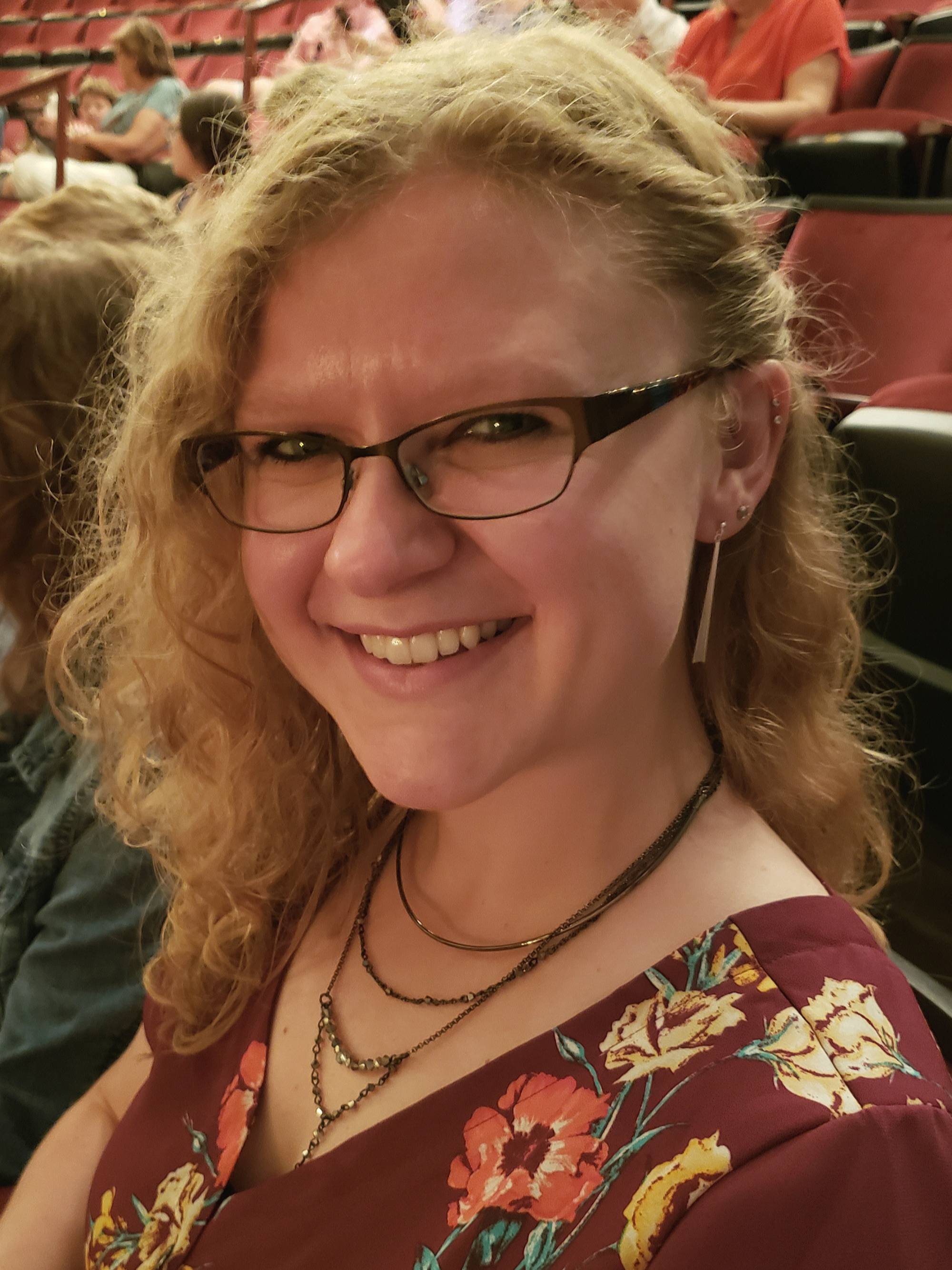 A portrait of Olivia Martin at a stadium.